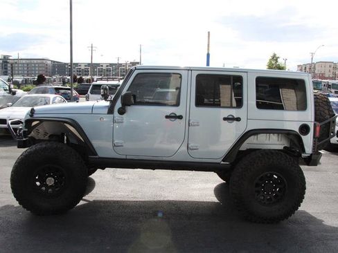 Used 2012 Jeep Wrangler Unlimited Rubicon w/ Dual Top Group AWD/4WD image 4