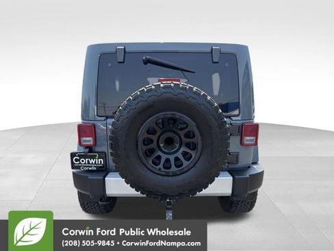 Used 2014 Jeep Wrangler Unlimited Sahara w/ Dual Top Group AWD/4WD image 6