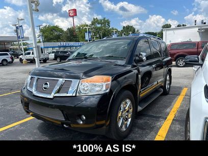 Used 2014 Nissan Armada Platinum w/ 2nd Row Captain Seat Package