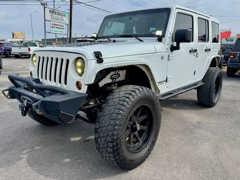 Used 2014 Jeep Wrangler Unlimited Sahara w/ Connectivity Group image 1