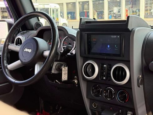 Used 2010 Jeep Wrangler Unlimited Sahara w/ Dual Top Group AWD/4WD image 26