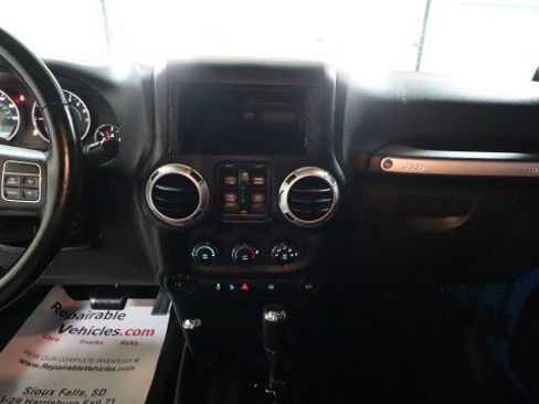 Used 2012 Jeep Wrangler Unlimited Sahara w/ Dual Top Group AWD/4WD image 12