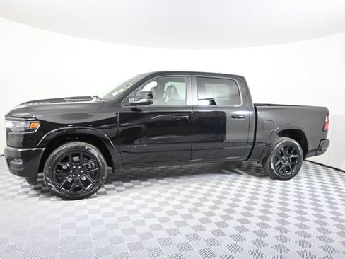 Used 2025 RAM 1500 Laramie w/ Night Edition AWD/4WD image 2