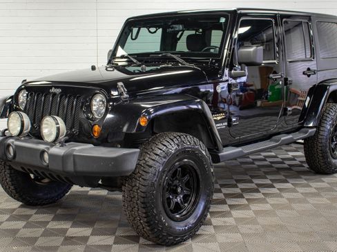 Used 2013 Jeep Wrangler Unlimited Sahara w/ Dual Top Group AWD/4WD image 7