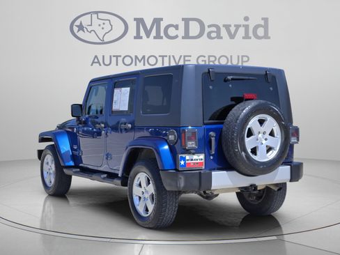 Used 2010 Jeep Wrangler Unlimited Sahara w/ Dual Top Group AWD/4WD image 4