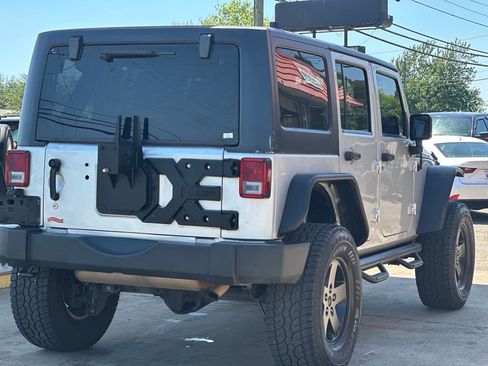 Used 2012 Jeep Wrangler Unlimited Sport AWD/4WD image 6