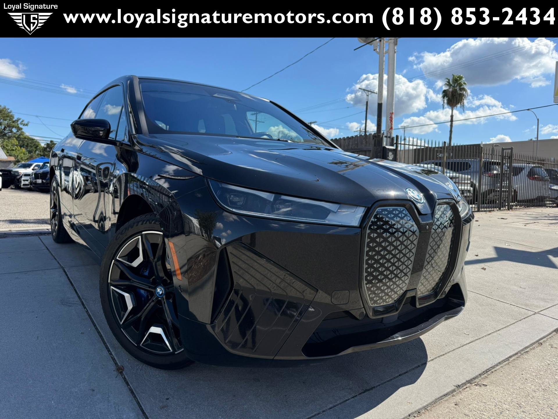 Used 2024 BMW iX xDrive50 w/ Sport Package AWD/4WD image 1