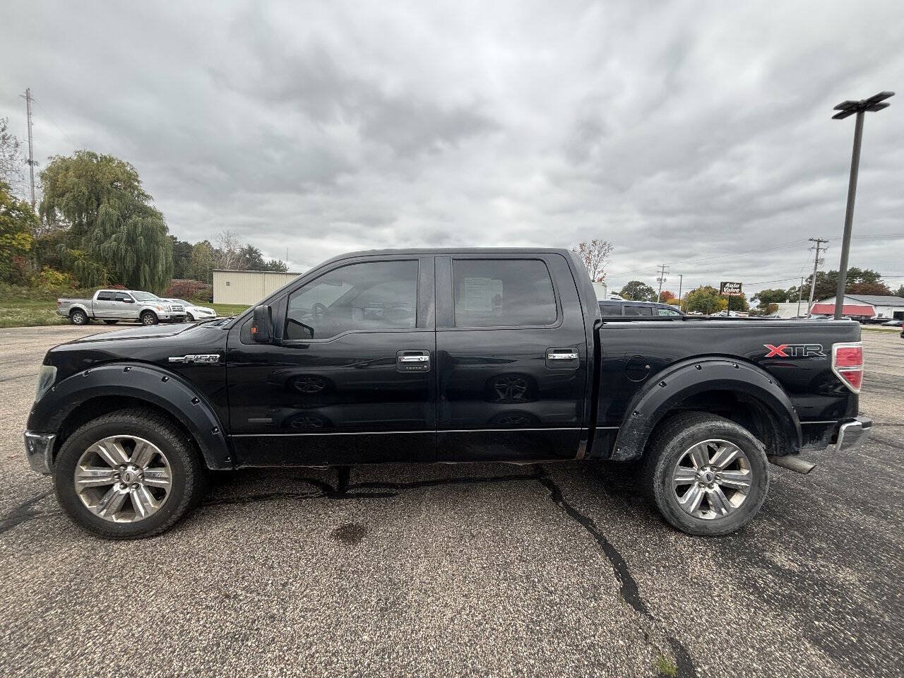 Used 2014 Ford F150 XLT w/ Equipment Group 302A Luxury AWD/4WD image 1