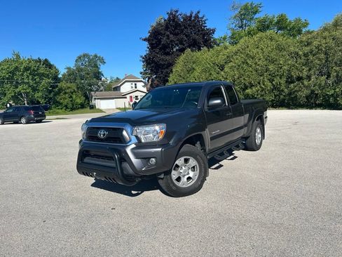 Used 2013 Toyota Tacoma 4x4 Access Cab w/ SR5 Pkg image 1