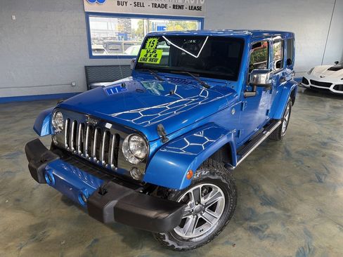 Used 2016 Jeep Wrangler Unlimited Sahara w/ Mopar Chrome Edition Group AWD/4WD image 1