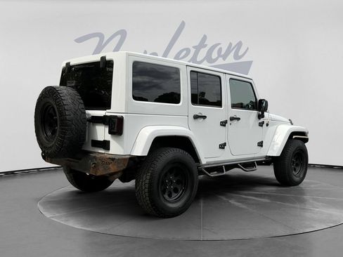 Used 2012 Jeep Wrangler Unlimited Sahara w/ Dual Top Group AWD/4WD image 8