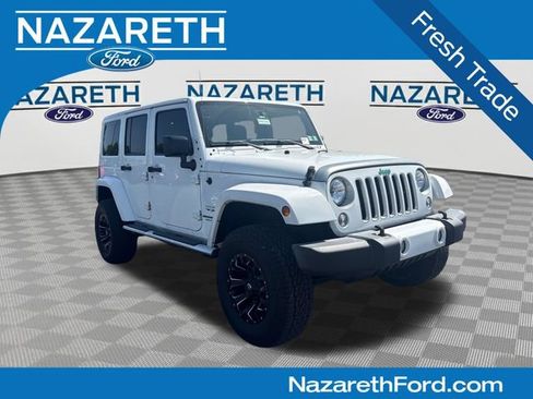 Used 2016 Jeep Wrangler Unlimited Sahara w/ Mopar Chrome Edition Group AWD/4WD image 1
