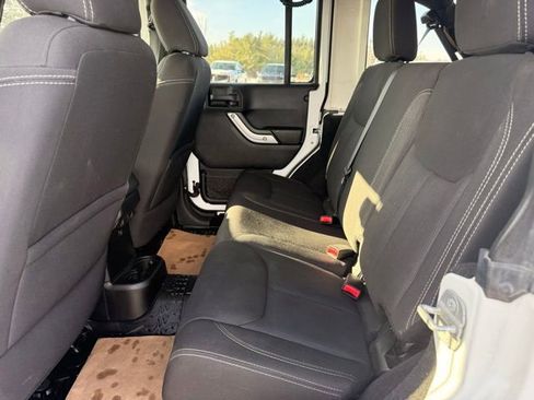 Used 2014 Jeep Wrangler Unlimited Sahara w/ Dual Top Group image 12