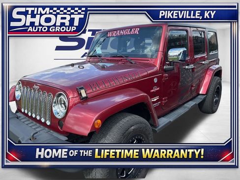 Used 2012 Jeep Wrangler Unlimited Sahara w/ Dual Top Group image 1