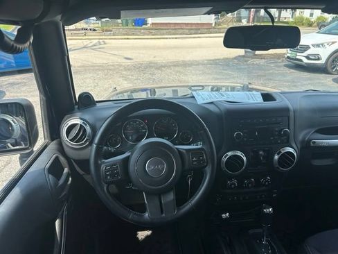 Used 2013 Jeep Wrangler Unlimited Sahara w/ Dual Top Group AWD/4WD image 14