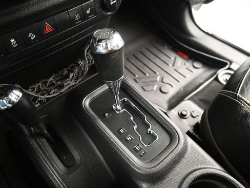 Used 2014 Jeep Wrangler Unlimited Sahara w/ Dual Top Group AWD/4WD image 24