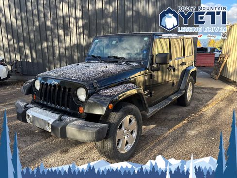 Used 2009 Jeep Wrangler Unlimited Sahara w/ Dual Top Group image 1