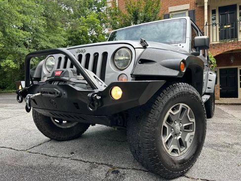 Used 2014 Jeep Wrangler Unlimited Sport AWD/4WD image 2