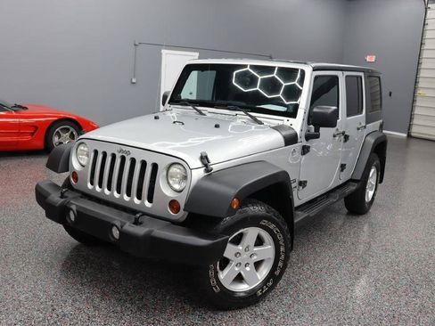 Used 2012 Jeep Wrangler Unlimited Sport AWD/4WD image 1