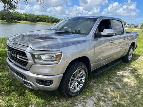 Used 2024 RAM 1500 Laramie AWD/4WD image 1