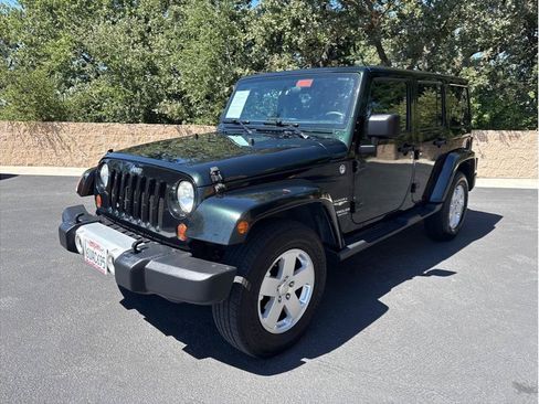 Used 2012 Jeep Wrangler Unlimited Sahara w/ Connectivity Group AWD/4WD image 3
