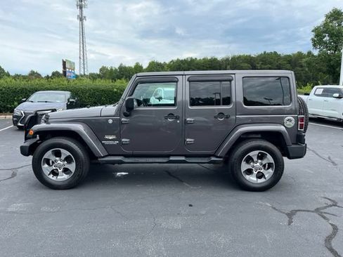 Used 2014 Jeep Wrangler Unlimited Sahara w/ Connectivity Group AWD/4WD image 12