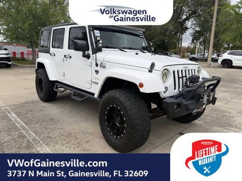 Used 2015 Jeep Wrangler Unlimited Sahara w/ Connectivity Group AWD/4WD image 1