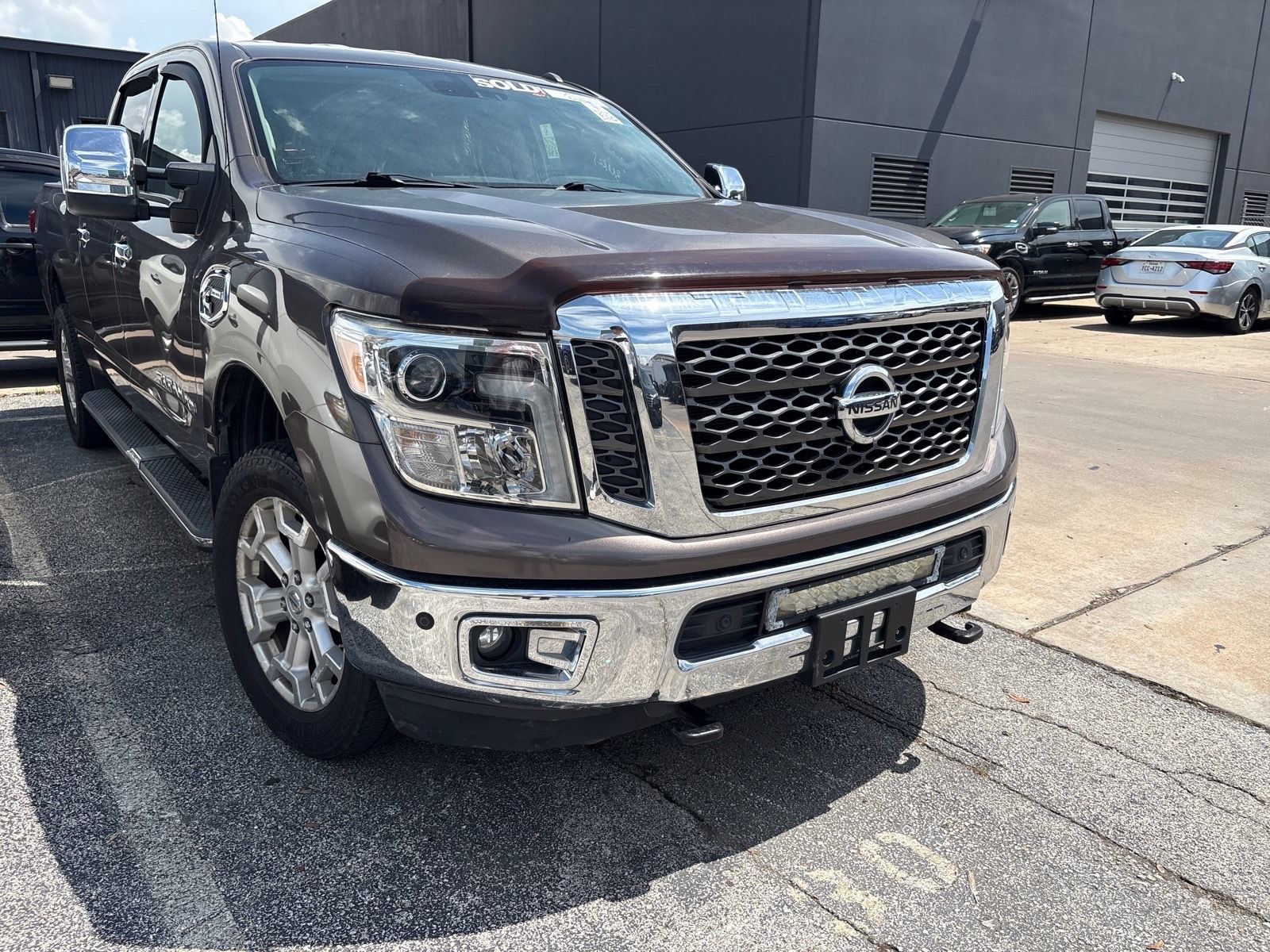Used 2016 Nissan Titan SL AWD/4WD image 1