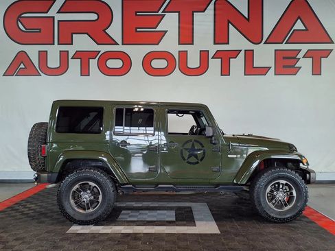 Used 2016 Jeep Wrangler Unlimited Sahara AWD/4WD image 1