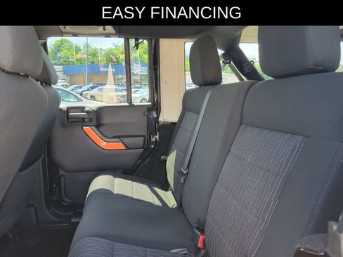 Used 2012 Jeep Wrangler Unlimited Sahara w/ Dual Top Group AWD/4WD image 10