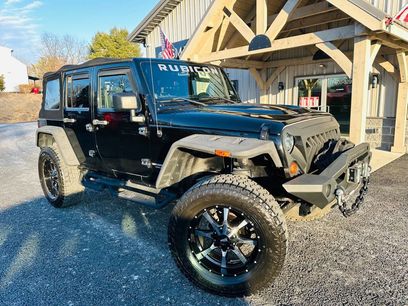 Used 2012 Jeep Wrangler Unlimited Rubicon w/ Dual Top Group