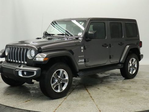 Used 2019 Jeep Wrangler Unlimited Sahara w/ Uconnect 4C Nav & Sound Group image 1