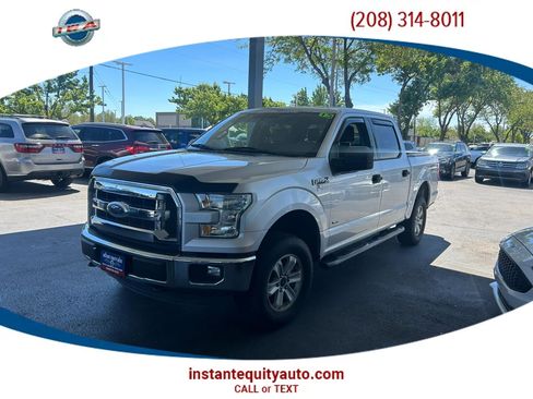 Used 2015 Ford F150 XLT AWD/4WD image 1