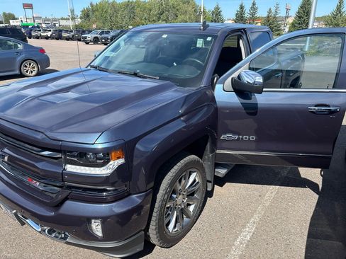 Used 2018 Chevrolet Silverado 1500 LTZ Z71 w/ Centennial Edition AWD/4WD image 3