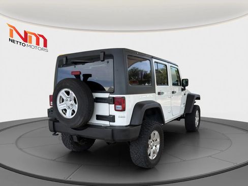 Used 2014 Jeep Wrangler Unlimited Sport w/ Connectivity Group AWD/4WD image 5