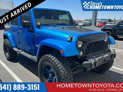 Used 2015 Jeep Wrangler Unlimited Sahara AWD/4WD image 1