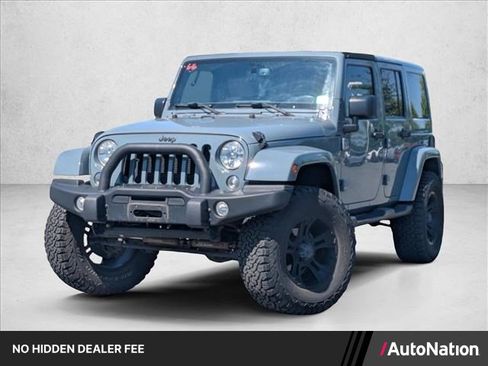 Used 2015 Jeep Wrangler Unlimited Sahara AWD/4WD image 1