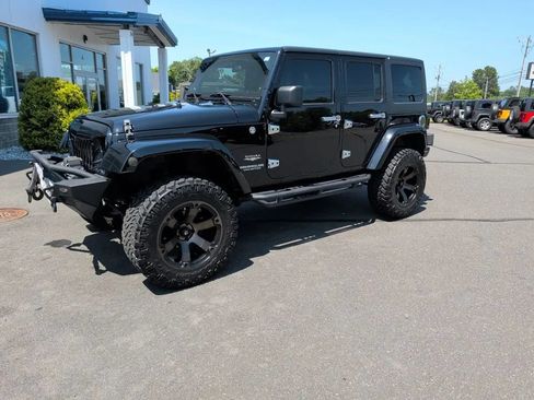 Used 2012 Jeep Wrangler Unlimited Sahara w/ Dual Top Group AWD/4WD image 18