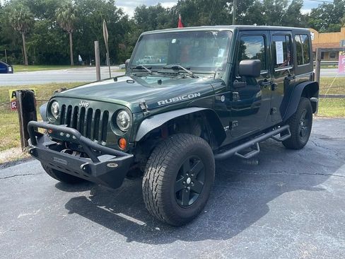 Used 2010 Jeep Wrangler Unlimited Rubicon w/ Dual Top Group AWD/4WD image 3