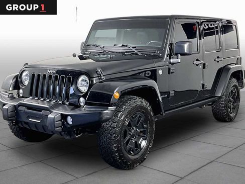 Used 2016 Jeep Wrangler Unlimited Sahara AWD/4WD image 1
