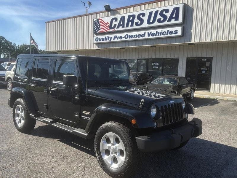 Used 2014 Jeep Wrangler Unlimited Sahara w/ Dual Top Group AWD/4WD image 1