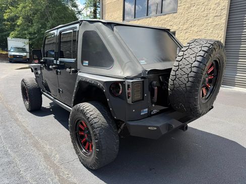 Used 2013 Jeep Wrangler Unlimited Sahara w/ Mopar Chrome Edition Group AWD/4WD image 10