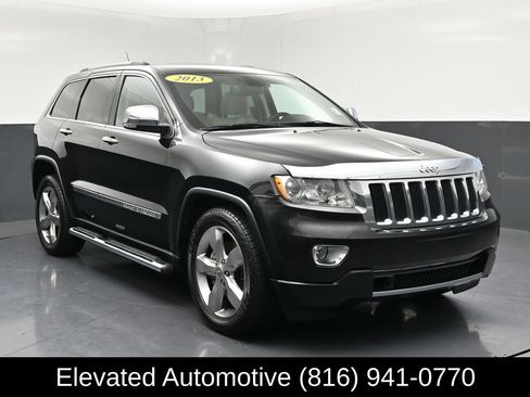 Used 2013 Jeep Grand Cherokee Limited w/ Mopar Chrome Edition Group AWD/4WD image 1