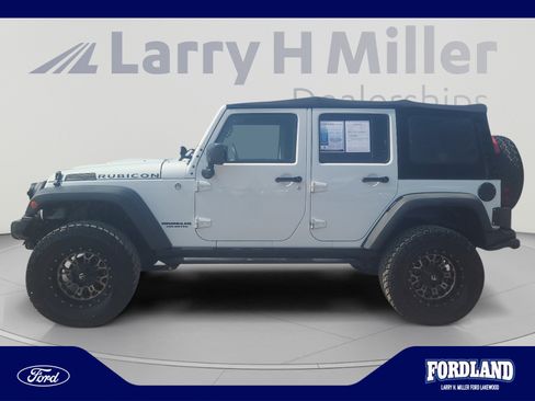 Used 2015 Jeep Wrangler Unlimited Rubicon w/ Dual Top Group AWD/4WD image 2