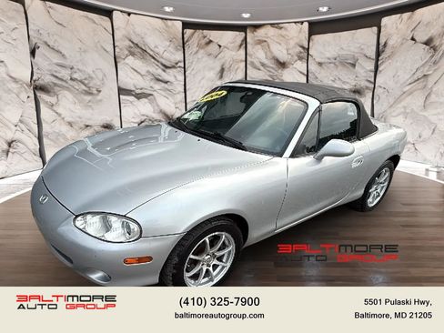 Used 2004 MAZDA MX-5 Miata w/ Cloth Azure Blue Pkg RWD image 1