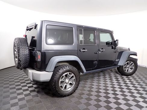 Used 2014 Jeep Wrangler Unlimited Rubicon w/ Dual Top Group AWD/4WD image 16