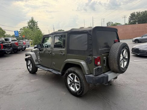 Used 2015 Jeep Wrangler Unlimited Sahara w/ Dual Top Group AWD/4WD image 7