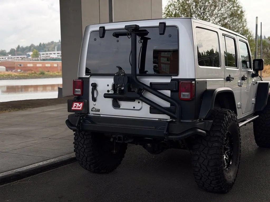 Used 2011 Jeep Wrangler Unlimited Rubicon w/ Dual Top Group AWD/4WD image 17