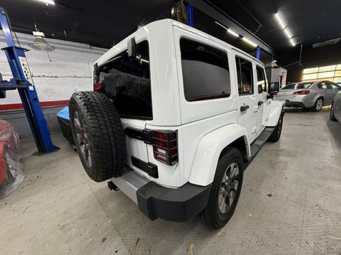 Used 2014 Jeep Wrangler Unlimited Sahara w/ Dual Top Group image 4