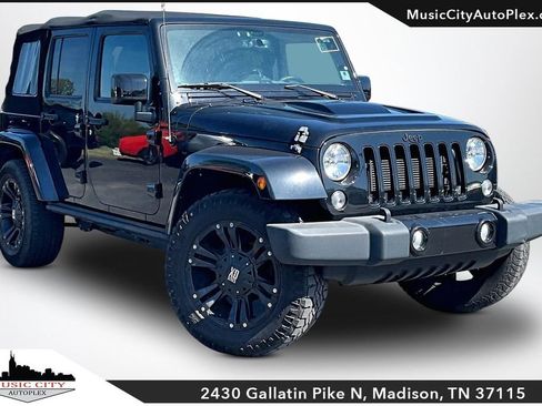 Used 2015 Jeep Wrangler Unlimited Sahara AWD/4WD image 1